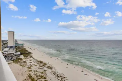 a view of the beach from the balcony of a condo at Emerald Beach #1426 by Book That Condo in Panama City Beach