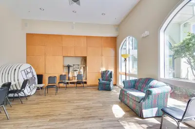 a living room with a couch and chairs at Celadon Beach Resort #1104 by Book That Condo in Panama City Beach
