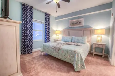 a bedroom with a bed and a window at BEAUTIFUL 3 BD Laketown Wharf 1133- Best Amenities! in Panama City Beach