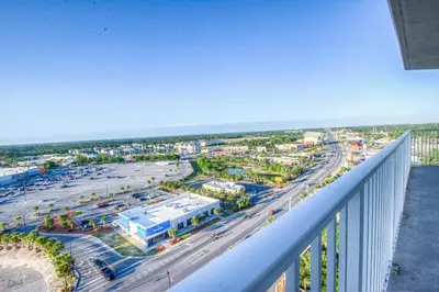 a view of a parking lot from a balcony at Laketown Wharf 1238 - Brand New End Unit With Wrap Around Balcony in Panama City Beach