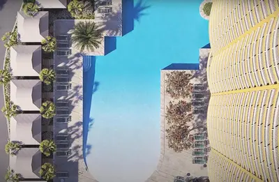 an overhead view of two tall buildings with palm trees at Calypso 3-205 in Panama City Beach