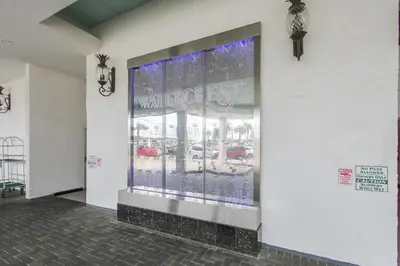 a window of a store with a sign on it at Watercrest #1206 by Book That Condo in Panama City Beach