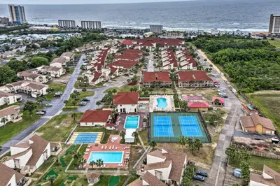 an aerial view of the resort with the ocean in the background at PCB Resort Condo with Private Balcony and 3 Pools! in Panama City Beach