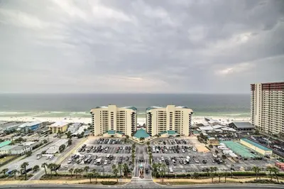 an aerial view of a parking lot in front of the ocean at 18th-Floor PCB Resort Condo with Amazing Gulf View! in Panama City Beach