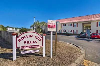 two signs in front of a building at Rollin Tide Villas- Rollin Tide B9 in Santa Rosa Beach