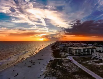 a view of the beach at sunset at Ocean Air Upper East Private Beach unit on 30A in Santa Rosa Beach