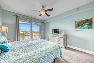a bedroom with a bed and a window at On the 3-d Floor, Laketown 324 - Large 2 BD , Great Views and Amenities in Panama City Beach
