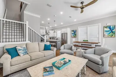 a living room with a couch and two chairs and a table at 30A Beach House - Beach Ready in Inlet Beach