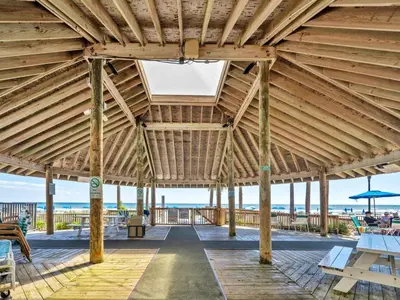 a wooden pavilion with a view of the ocean at Summerhouse 1009B in Panama City Beach