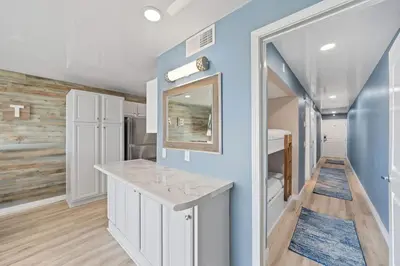 a kitchen with a counter and a sink in a room at The Summit 1408 in Panama City Beach