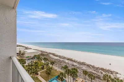 a view of the beach from the balcony of a condo at The Summit 820 in Panama City Beach