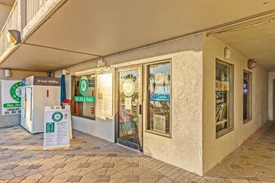 a building with windows and a sign in front of it at The Summit 1208 in Panama City Beach
