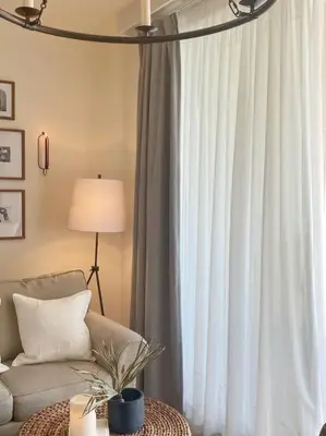 a living room with a couch and a window at Shores of Panama Unit 1209 in Panama City Beach