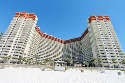 two large buildings on the beach with a beach at Shores of Panama #1725 at Book That Condo in Panama City Beach