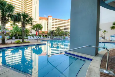 a swimming pool in front of a hotel at Next To The 10th Floor Pool - Laketown Wharf 1032- 2 BD Plus Bunks, 2BA, And Amazing Amenities! in Panama City Beach