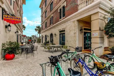 a group of bikes parked outside of a building at Beachwood Villas 6D- Beach Time Oasis in Santa Rosa Beach