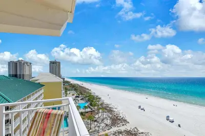a view of the beach from the balcony of a condo at Sterling Reef 401 in Panama City Beach