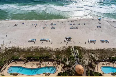 an aerial view of a beach with two swimming pools at Calypso 1-2208 East in Panama City Beach