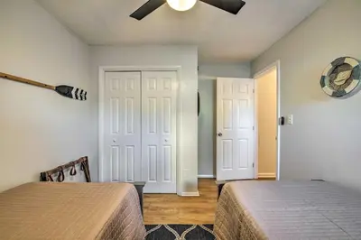a bedroom with two beds and a ceiling fan at PCB Condo Rental with Pool Access, Steps to Beach! in Panama City Beach