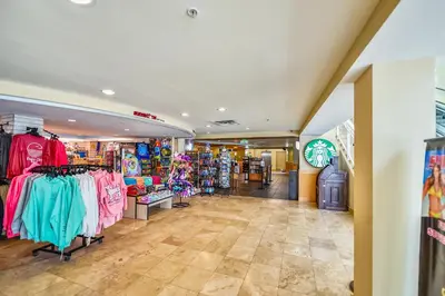 a store with a lot of clothes on display at Emerald Beach #1227 by Book That Condo in Panama City Beach