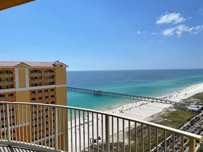 a view of the beach from the balcony of a resort at Calypso 3-2303 Penthouse Level w/ Incredible View! in Panama City Beach