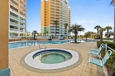 a swimming pool with a hot tub in a resort at En Soleil Beach Resort by Panhandle Getaways in Panama City Beach