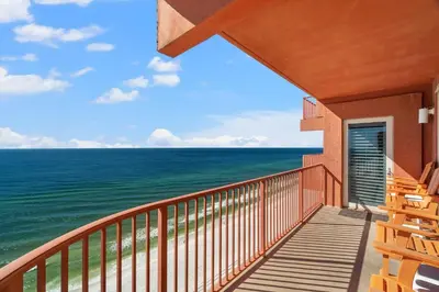 a balcony with a view of the ocean at Summer By The Sea Unit 2203 in Panama City Beach