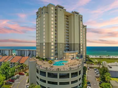 an aerial view of a tall building with a pool at Grand Panama Beach Resort by Panhandle Getaways in Panama City Beach
