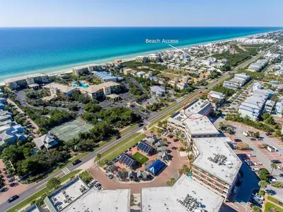 an aerial view of the beach houses and the ocean at 30A Villages of South Walton by Panhandle Getaways in Seacrest