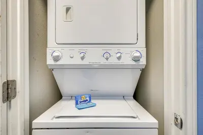 a white stove with a box on top of it at Shores of Panama #124 by Book That Condo in Panama City Beach