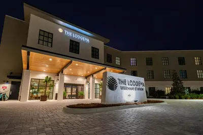 a building with a sign in front of it at The Lodge 30A in Santa Rosa Beach