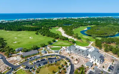 an aerial view of a resort with the ocean at Camp Creek Inn in Seacrest