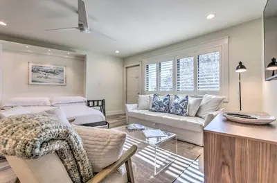 a living room with a couch and a table at Santa Rosa Beach Studio Condo Less Than 1 Mi to Beach in Santa Rosa Beach