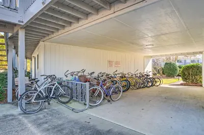 a group of bikes parked in a garage at Santa Rosa Beach Studio Condo Less Than 1 Mi to Beach in Santa Rosa Beach
