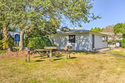 a house with a sign in front of it at Santa Rosa Beach Studio Condo Less Than 1 Mi to Beach in Santa Rosa Beach