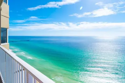 a view of the ocean from a balcony at Tidewater2808 in Panama City Beach