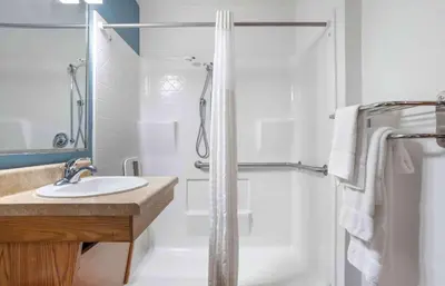 a bathroom with a shower and a sink at Extended Stay America Select Suites - Panama City - Callaway in Callaway