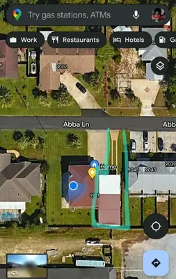 a map of a yard with a house at Hidden Gem Guest House in Panama City Beach
