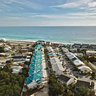 Sunny PCB Home with Balcony Steps to the Beach!