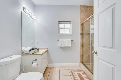 a bathroom with a shower and a toilet at Renovated PCB Studio, 2 Min Walk To Laguna Beach! in Panama City Beach
