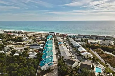 an aerial view of a resort near the ocean at Renovated PCB Studio, 2 Min Walk To Laguna Beach! in Panama City Beach