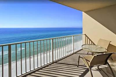 a balcony with a view of the ocean at Tidewater 1102 in Panama City Beach