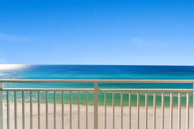 a view of the beach with the ocean in the background at Emerald Beach #1330 by Book That Condo in Panama City Beach