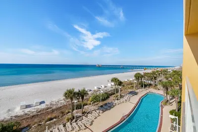 a view of the beach from the balcony of a resort at Calypso Resort Beachfront Condo in Panama City Beach