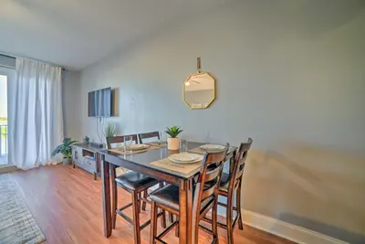 a dining room with a table and chairs at Lagoon-View Balcony! Family Resort Escape in PCB in Panama City Beach