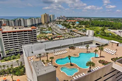 an aerial view of a resort with a swimming pool at Lagoon-View Balcony! Family Resort Escape in PCB in Panama City Beach