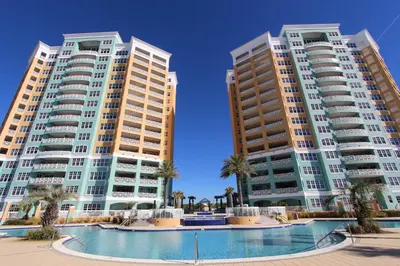 two tall buildings with a pool in front of them at En Soleil #1522 West in Panama City Beach