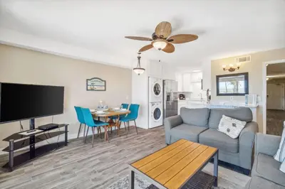 a living room with a couch and a table at The Summit 108 in Panama City Beach