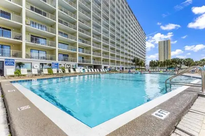 a large swimming pool in front of a building at The Summit 306 in Panama City Beach