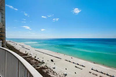 a view of the beach from a balcony at Ocean Villa 1101 in Panama City Beach